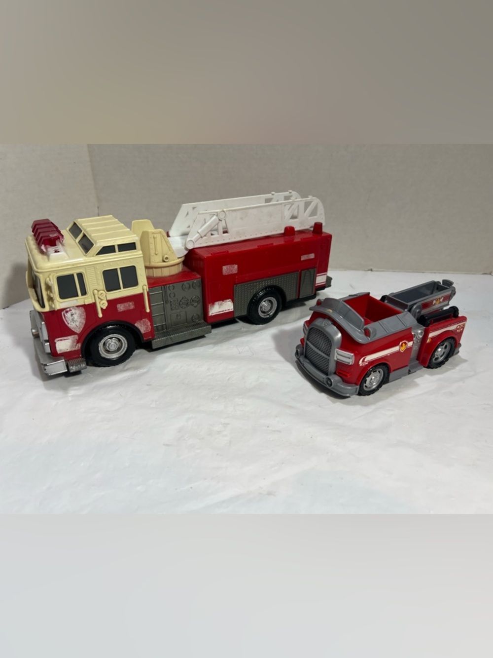 Set of 2 Fire Trucks:
PAW PATROL Marshall’s & TONKA  - Red Toy w/ lights & horns
